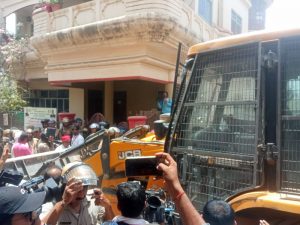 The house being demolished by authorities image source News Jani